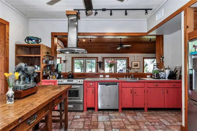 a bedroom with a bed and a fireplace
