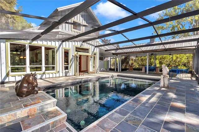 a bathroom with a granite countertop sink mirror and double