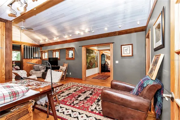 a kitchen with stainless steel appliances a refrigerator sink and cabinets