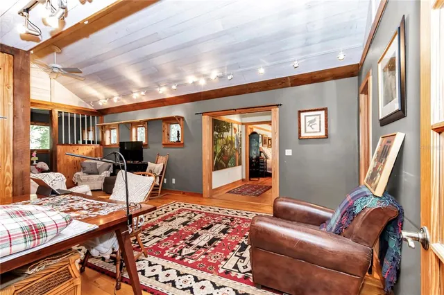 a kitchen with stainless steel appliances a refrigerator sink and cabinets