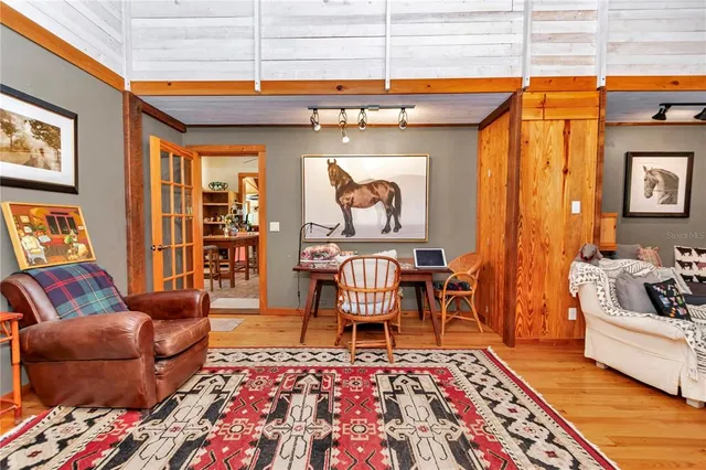 a kitchen with granite countertop stainless steel appliances and wooden cabinets
