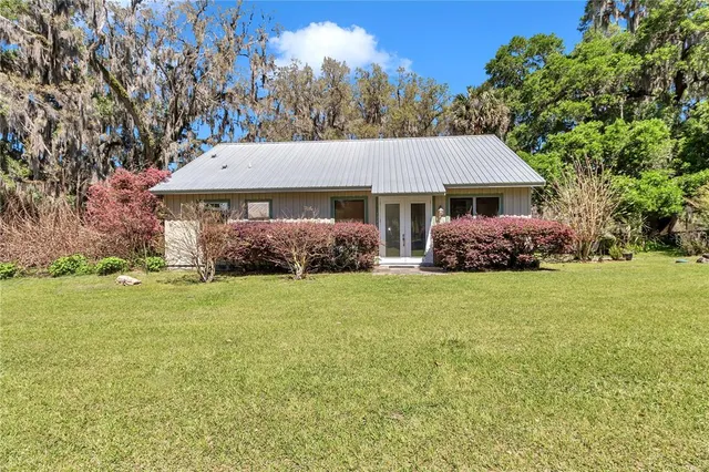 a house with trees in front of it