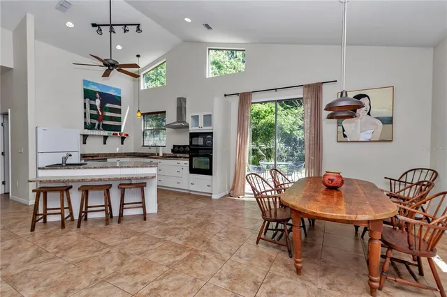 a view of walk in closet with clothes