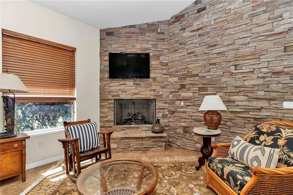 a view of a park with large trees