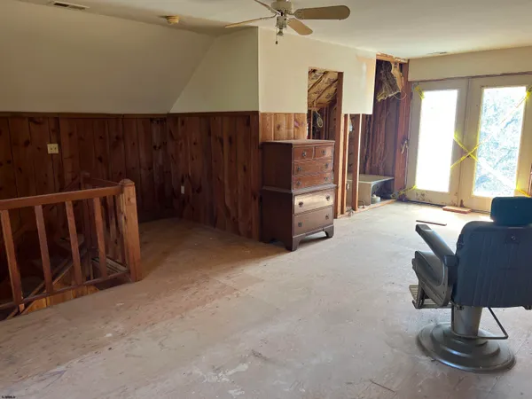 a view of livingroom with furniture and window