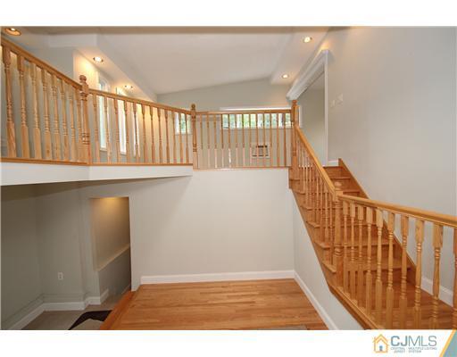 9 Greenwich Road Edison, NJ 08820 - Photo 14 of 25 a view of an entryway with wooden floor