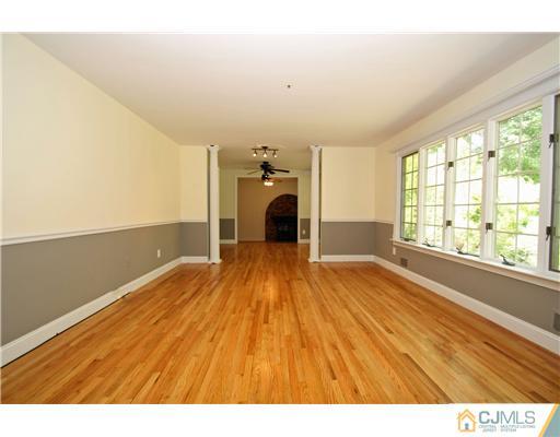 9 Greenwich Road Edison, NJ 08820 - Photo 5 of 25 a view of a livingroom with wooden floor
