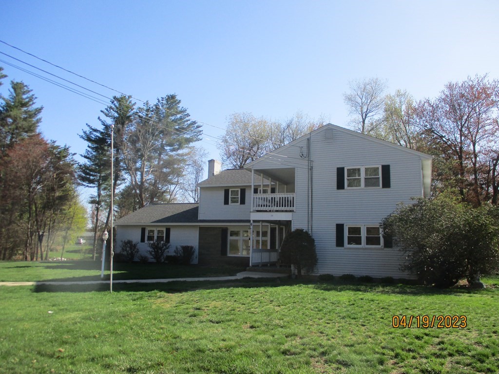 5 Kitchener Road Sterling, MA 01564 - Photo 1 of 29 a view of a house with a yard