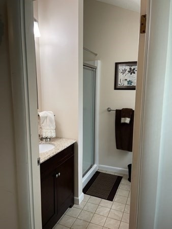 5 Kitchener Road Sterling, MA 01564 - Photo 14 of 29 a bathroom with a sink and a mirror