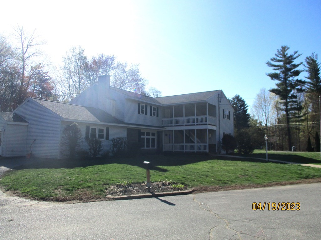 5 Kitchener Road Sterling, MA 01564 - Photo 2 of 29 a view of a brick wall next to a yard