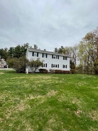 5 Kitchener Road Sterling, MA 01564 - Photo 27 of 29 a view of a big house with a big yard and large trees