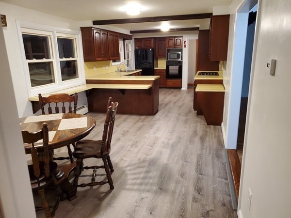 5 Kitchener Road Sterling, MA 01564 - Photo 5 of 29 a view of a dining room with furniture and window
