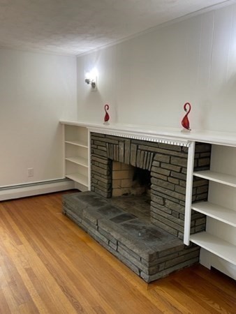 5 Kitchener Road Sterling, MA 01564 - Photo 6 of 29 a room with fireplace