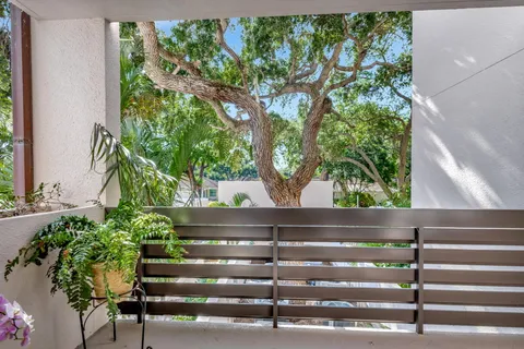 a bathroom with a sink mirror and vanity
