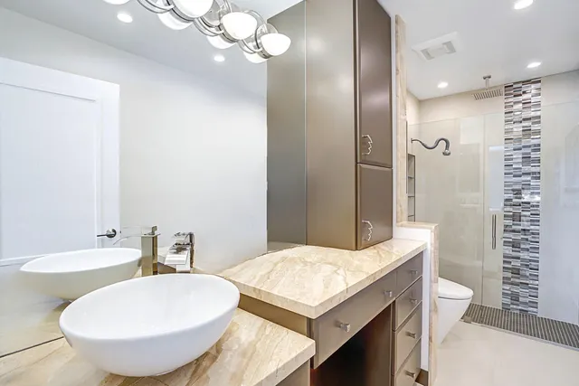 a glass door and chair in a room