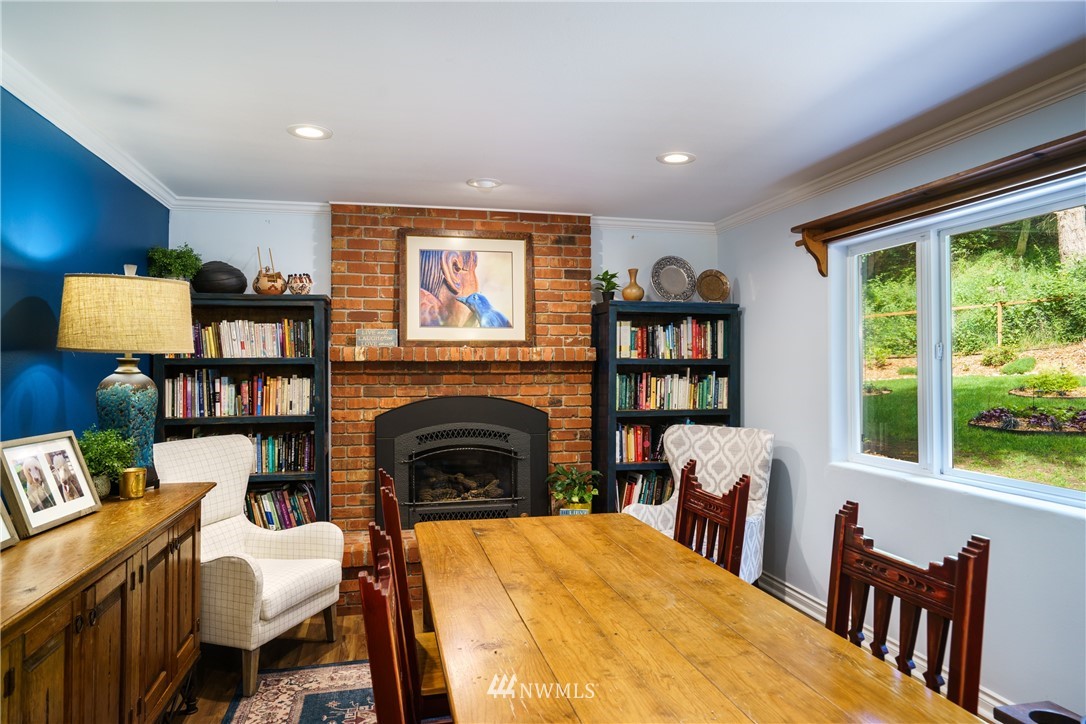 1230 Cedar Circle Langley, WA 98260 - Photo 15 of 39 a living room with furniture and a fireplace