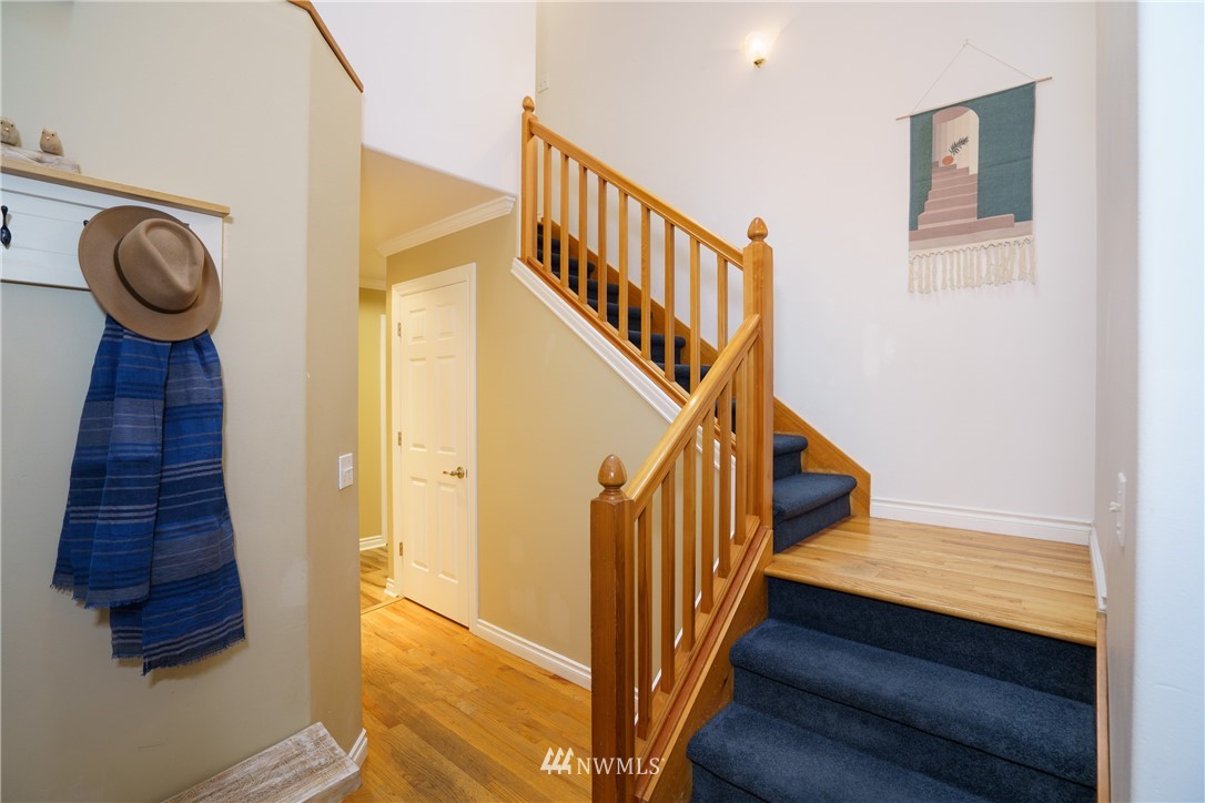 1230 Cedar Circle Langley, WA 98260 - Photo 16 of 39 a view of a hallway with wooden floor and entryway