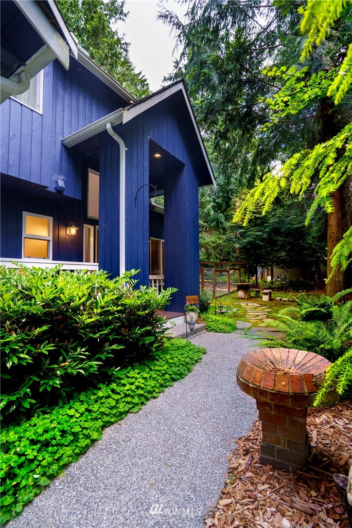 1230 Cedar Circle Langley, WA 98260 - Photo 30 of 39 a view of a house with backyard and garden