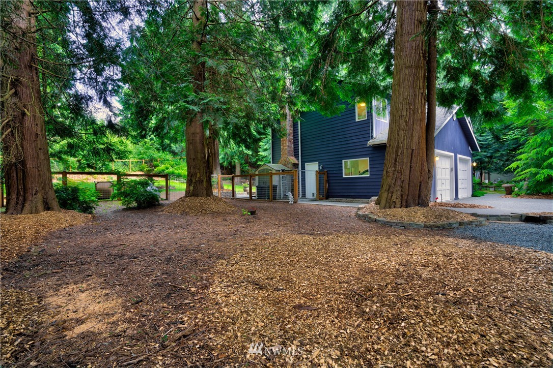 1230 Cedar Circle Langley, WA 98260 - Photo 37 of 39 a view of a house with a tree in the background