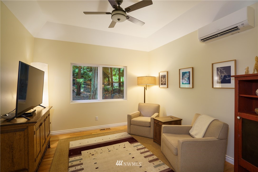 1230 Cedar Circle Langley, WA 98260 - Photo 7 of 39 a living room with furniture and a flat screen tv