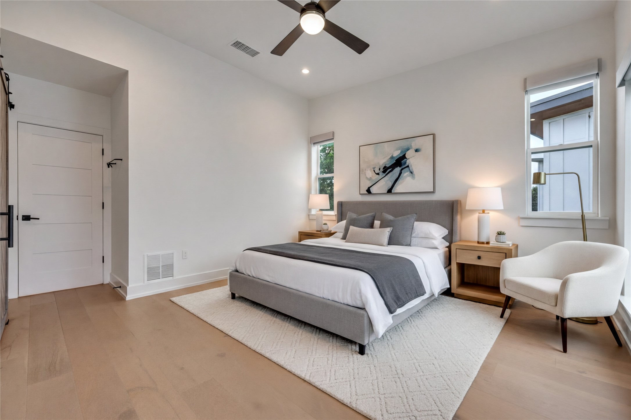 108 Tillery Street, Unit 1 Austin, TX 78702 - Photo 14 of 40 a spacious bedroom with a bed and window