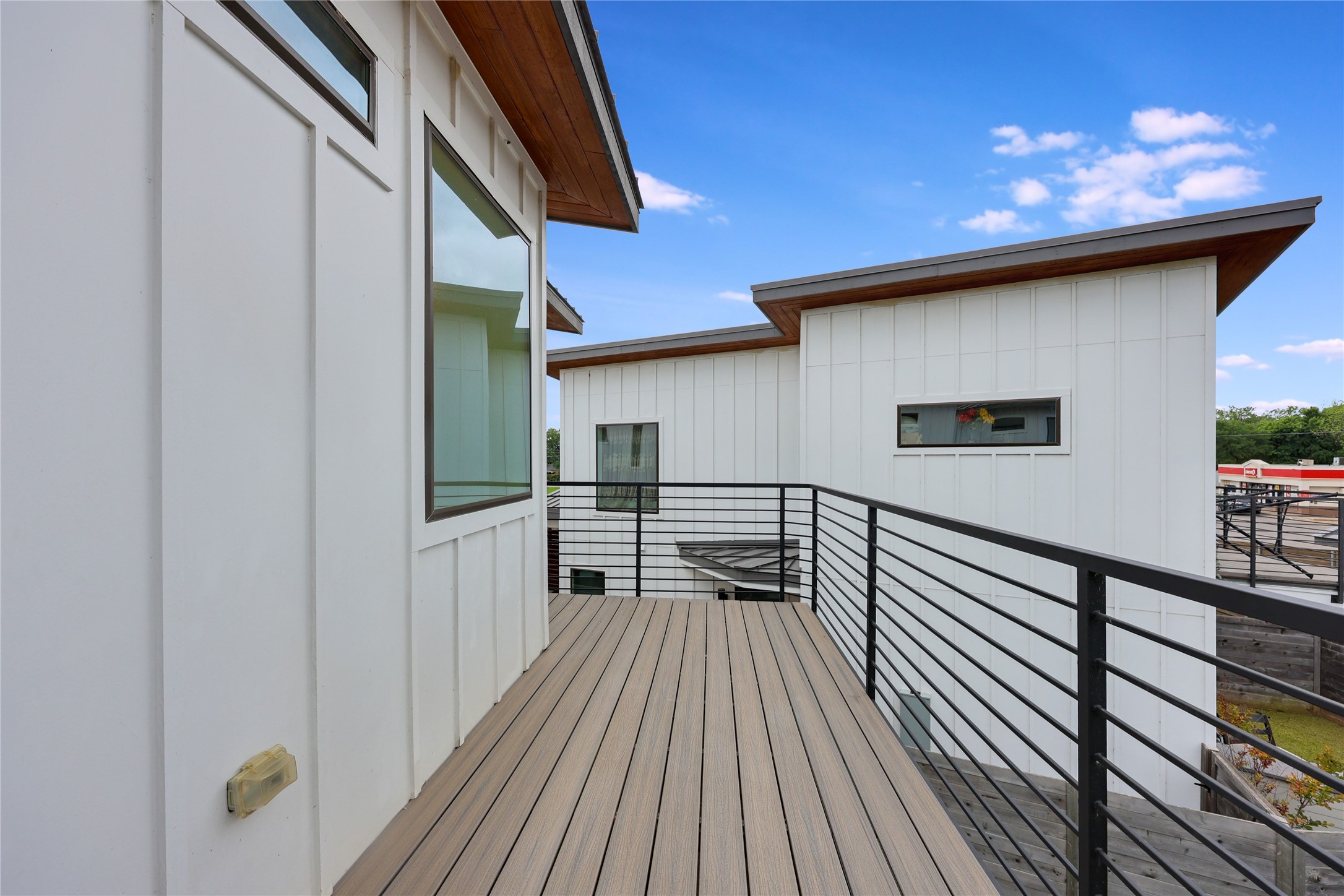 108 Tillery Street, Unit 1 Austin, TX 78702 - Photo 16 of 40 a view of balcony with wooden floor