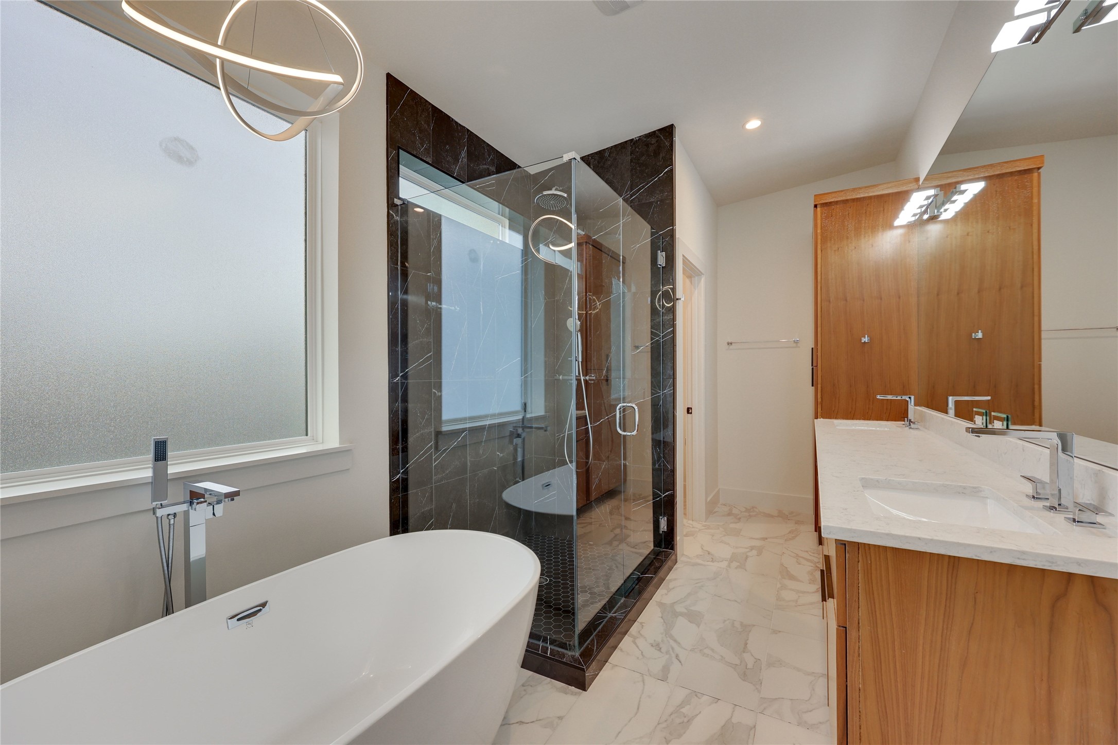 108 Tillery Street, Unit 1 Austin, TX 78702 - Photo 18 of 40 a bathroom with a sink a toilet and shower