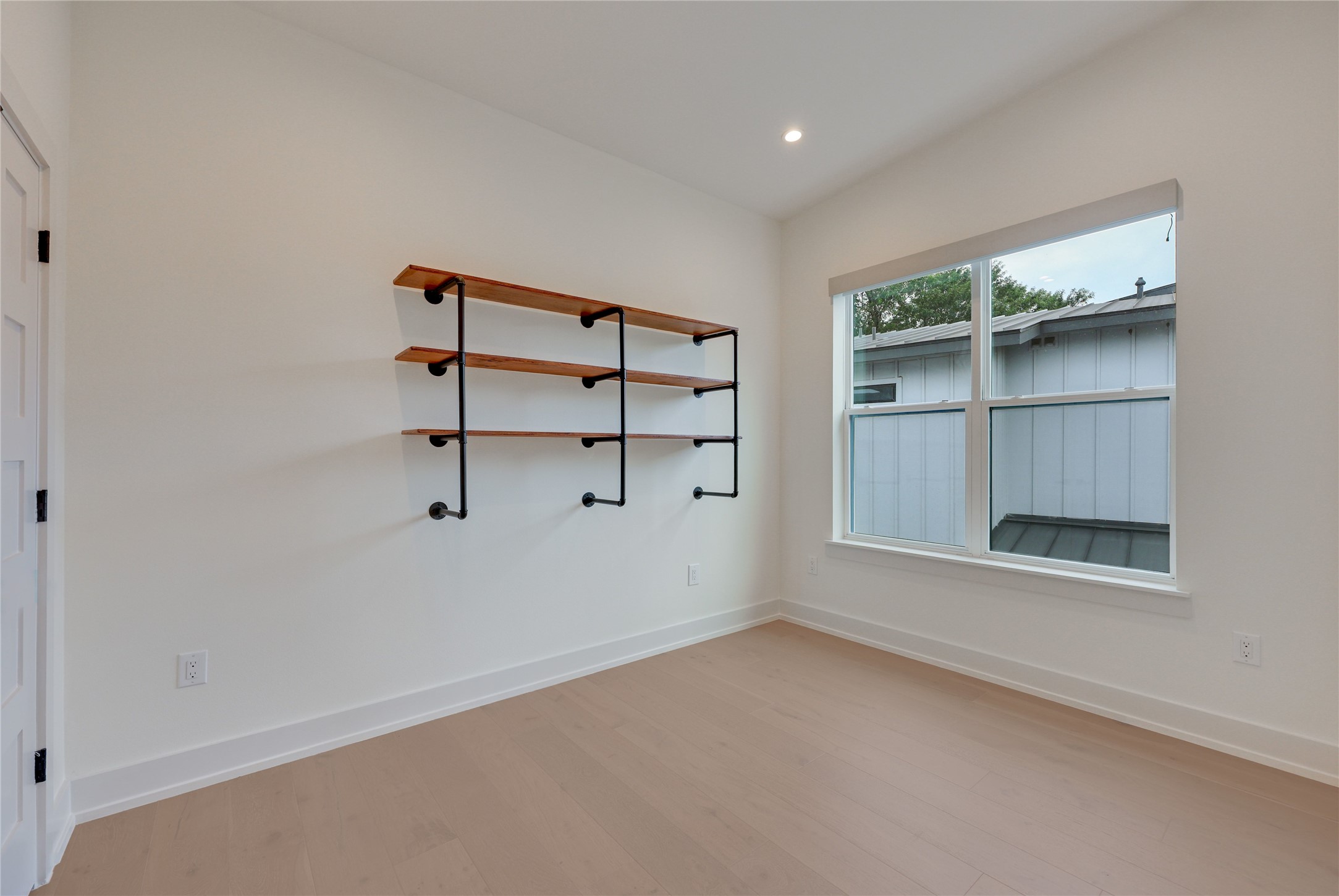 108 Tillery Street, Unit 1 Austin, TX 78702 - Photo 21 of 40 an empty room with a empty space