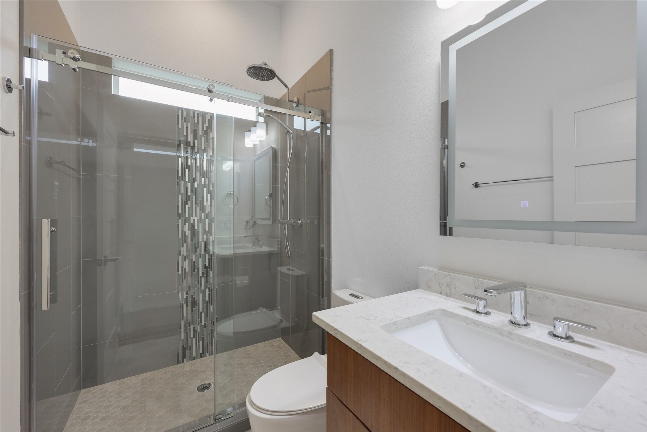 108 Tillery Street, Unit 1 Austin, TX 78702 - Photo 23 of 40 a bathroom with a sink toilet and shower