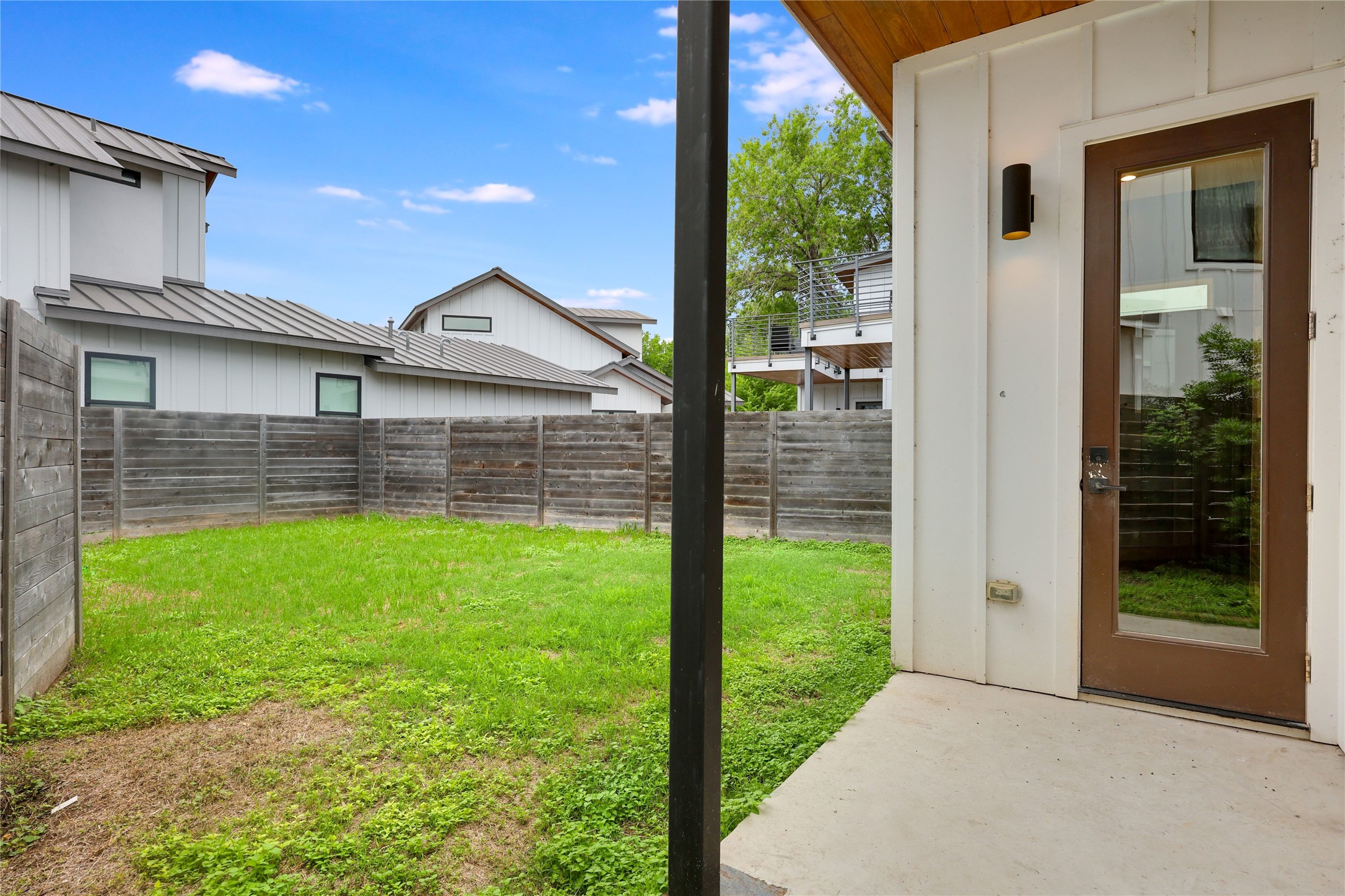 108 Tillery Street, Unit 1 Austin, TX 78702 - Photo 30 of 40 a view of a house with a backyard