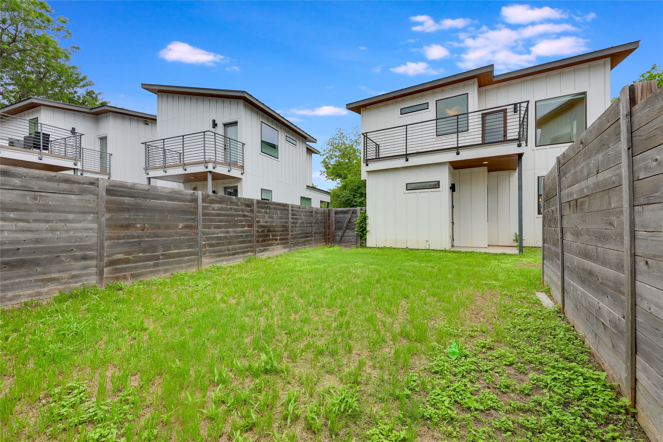 108 Tillery Street, Unit 1 Austin, TX 78702 - Photo 32 of 40 a view of a house with a yard