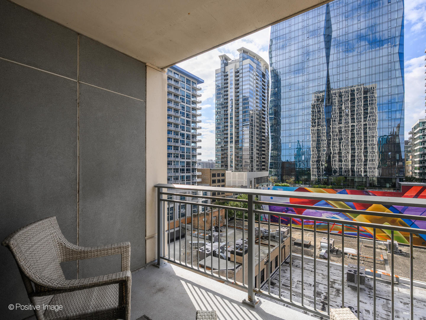 1250 South Michigan Avenue, Unit 910 Chicago, IL 60605 - Photo 18 of 26 a view of balcony with two chairs and table
