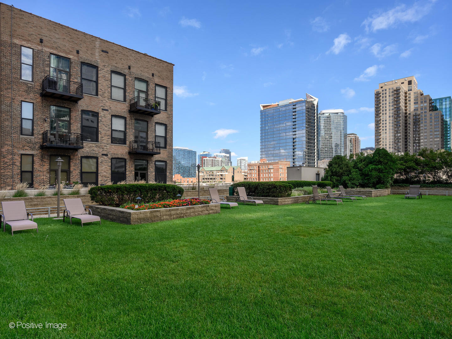 1250 South Michigan Avenue, Unit 910 Chicago, IL 60605 - Photo 23 of 26 a view of a city with tall buildings and a big yard