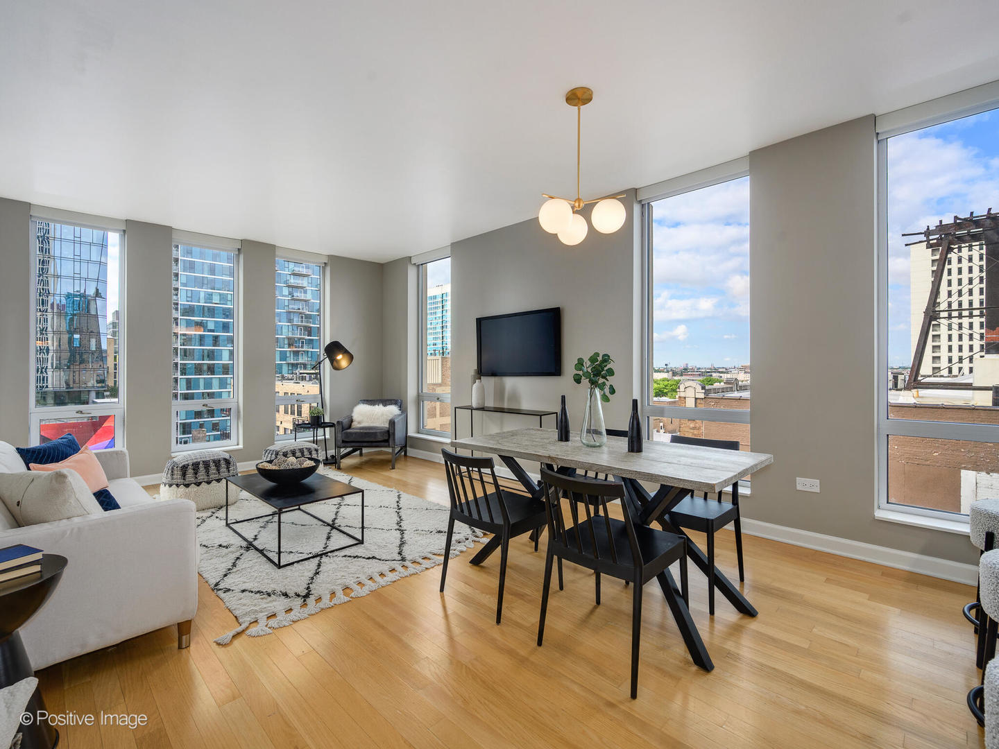 1250 South Michigan Avenue, Unit 910 Chicago, IL 60605 - Photo 4 of 26 a view of a livingroom with furniture window and wooden floor