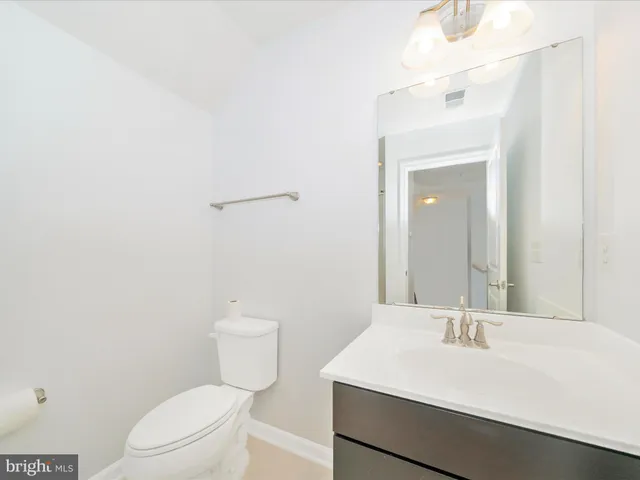 a view of a white building among the city view