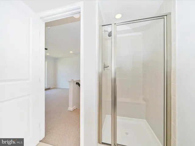 a view of a balcony with wooden floor and city view