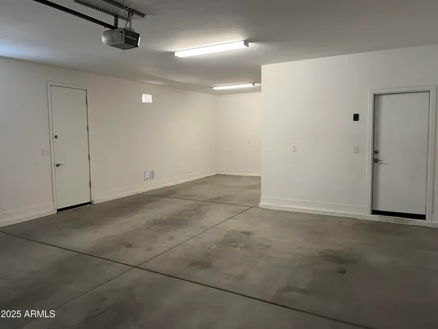 a view of a house with wooden floor and a window