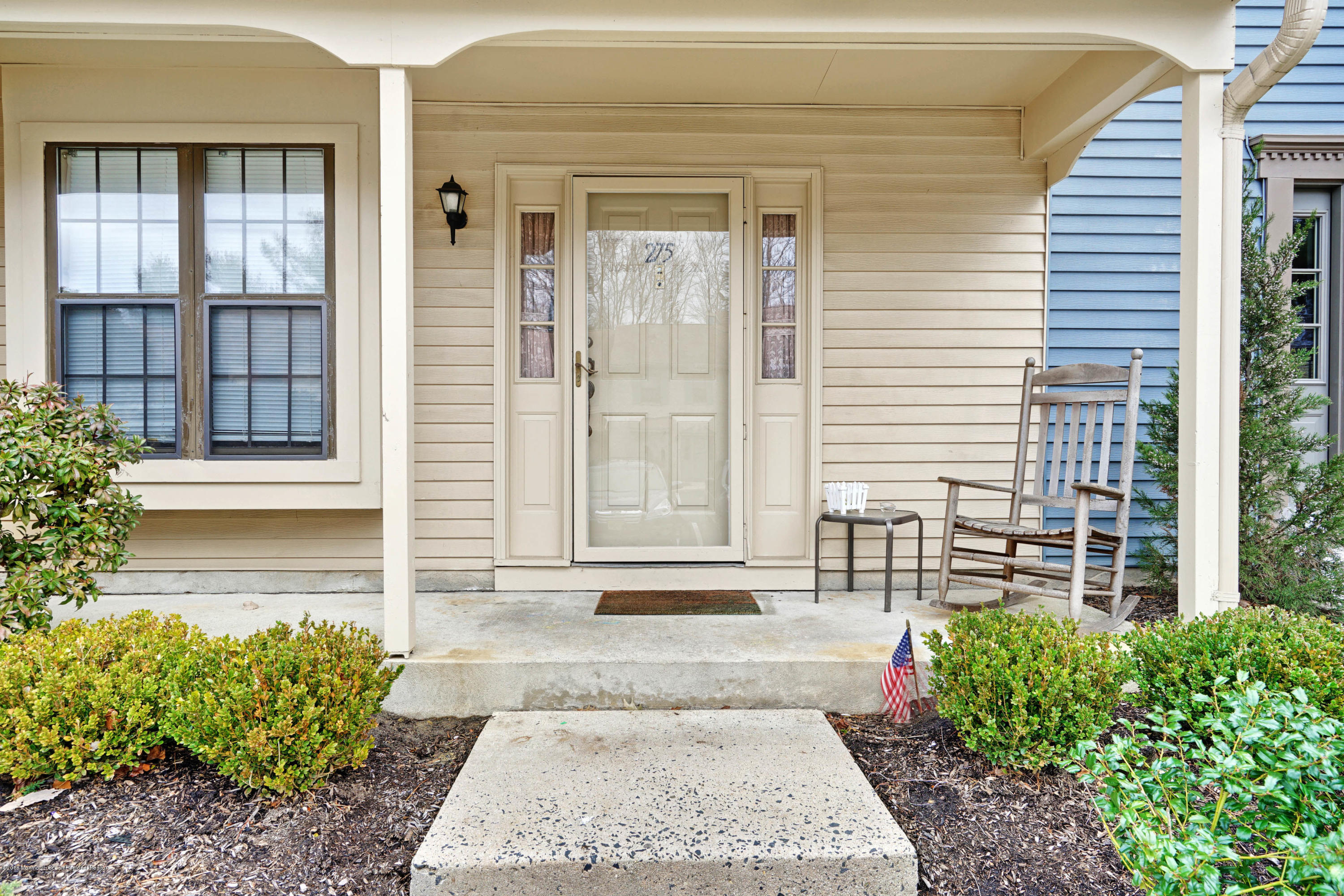 275 Gloucester Court Aberdeen, NJ 07747 - Photo 6 of 31 a front view of a house with a yard
