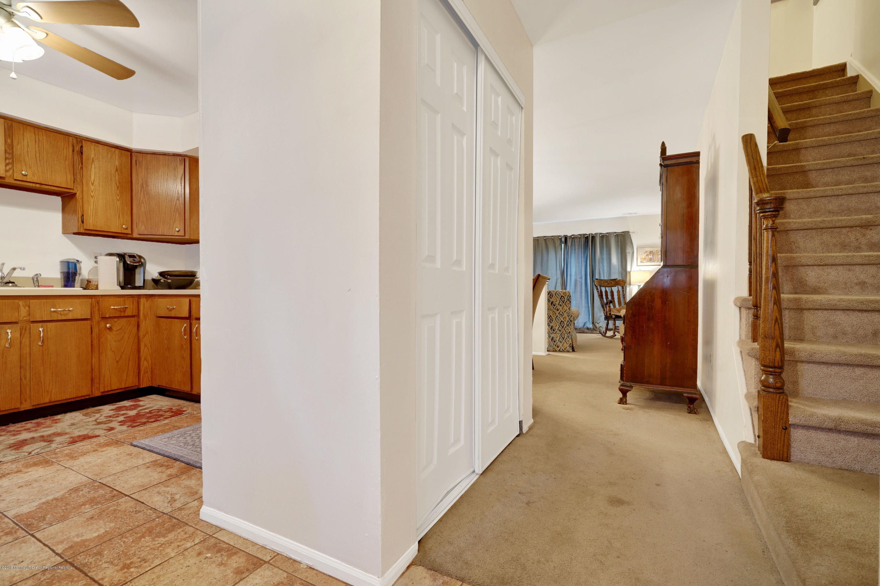 275 Gloucester Court Aberdeen, NJ 07747 - Photo 8 of 31 a view of a bedroom with a window and a bathroom