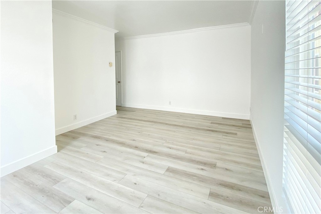 31 Spinnaker Street, Unit 15A Marina del Rey, CA 90292 - Photo 2 of 14 an empty room with wooden floor