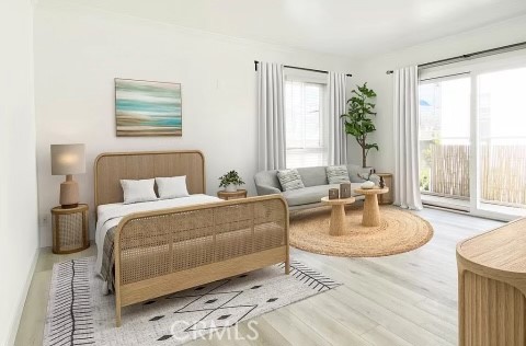 31 Spinnaker Street, Unit 15A Marina del Rey, CA 90292 - Photo 3 of 14 a living room with furniture and a large window