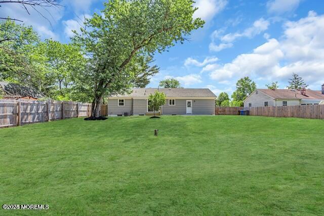 576 Francis Road Brick, NJ 08723 - Photo 6 of 9 a view of a house with a back yard
