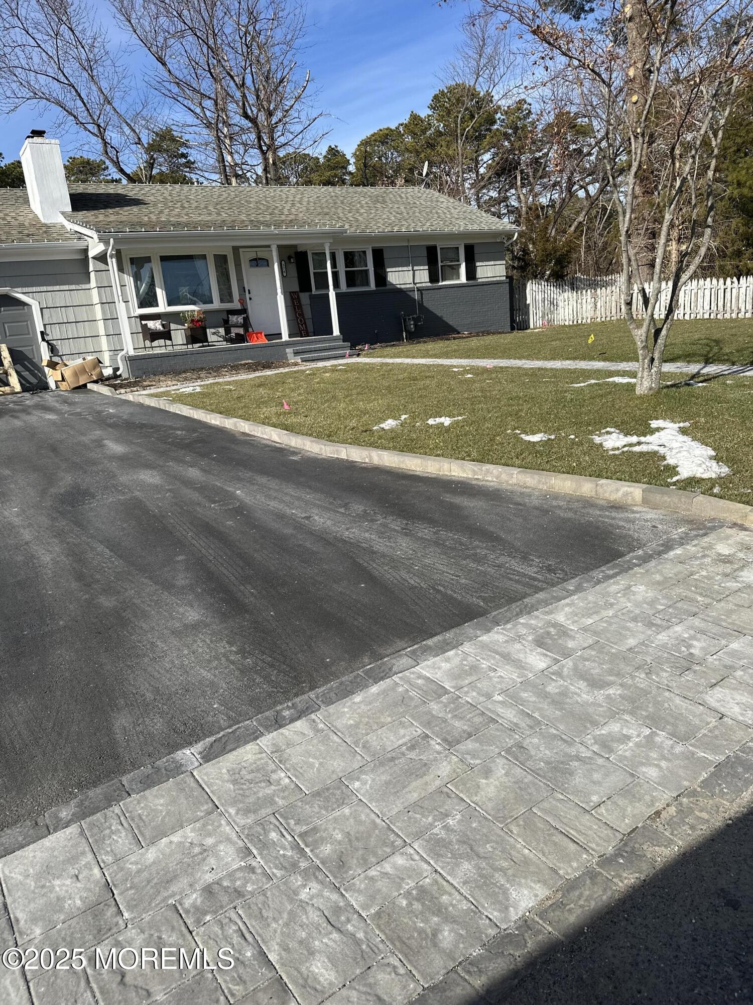 576 Francis Road Brick, NJ 08723 - Photo 8 of 9 a view of a big yard next to a building