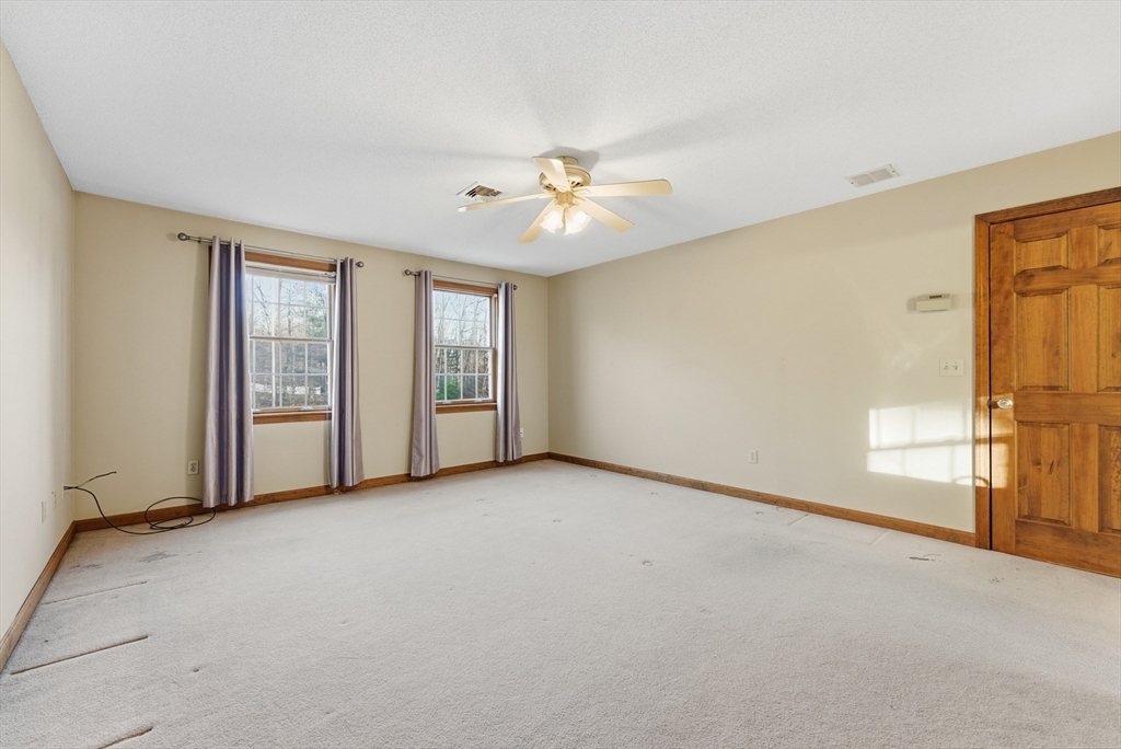 155 South Monson Road Hampden, MA 01036 - Photo 22 of 42 a view of an empty room with a window