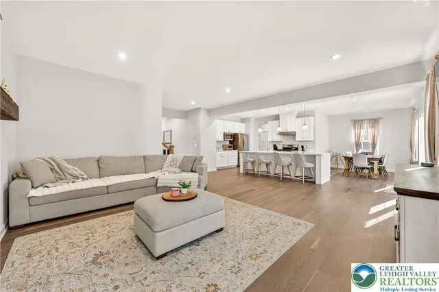 a kitchen with stainless steel appliances granite countertop a stove and a sink