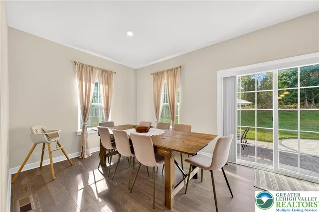 a view of hallway with wooden floor