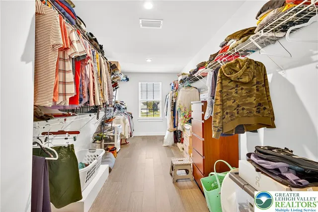 a bed room with a bed and a window