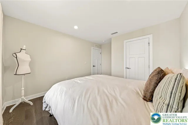 a view of a patio with a table chairs and a yard