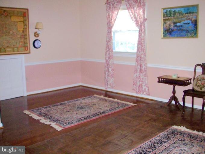 1499 Kimblewick Road Potomac, MD 20854 - Photo 16 of 17 a view of a workspace with furniture and a window