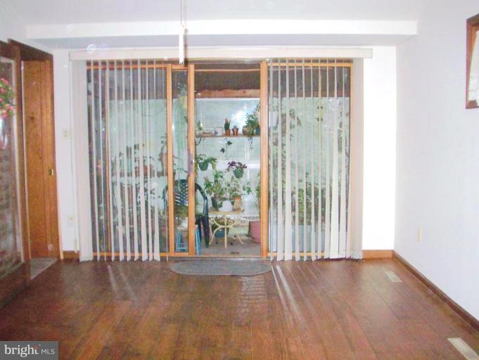 1499 Kimblewick Road Potomac, MD 20854 - Photo 3 of 17 a view of entryway with wooden floor